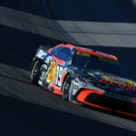 Chase Briscoe fends off Kyle Larson’s last-lap surge to win in Las Vegas - Yahoo Sports