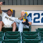 North Carolina fan visits Bob Uecker statue in upper deck at AmFam Field - Yahoo Sports
