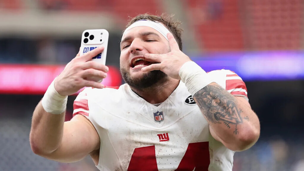 John Harbaugh defends Cam Skattebo's helmet-lowering technique - Yahoo Sports