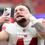 John Harbaugh defends Cam Skattebo's helmet-lowering technique - Yahoo Sports