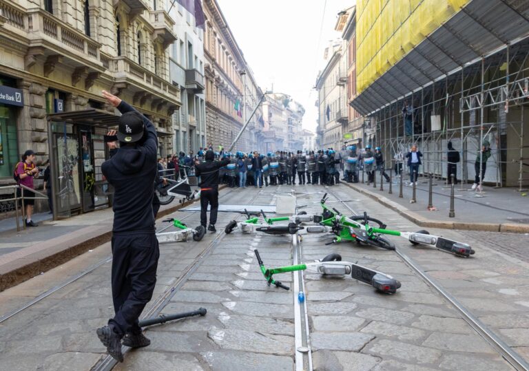 Rioters loot stores, set fires in central Milan during cost-of-living protest - SFGATE