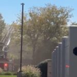 Car crashes into townhouse, catches fire in Naperville, Illinois - CBS News