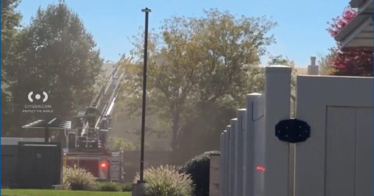 Car crashes into townhouse, catches fire in Naperville, Illinois - CBS News