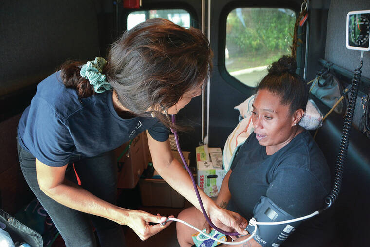 Storm aftermath: Big Island families continue rebuilding their lives - The Garden Island